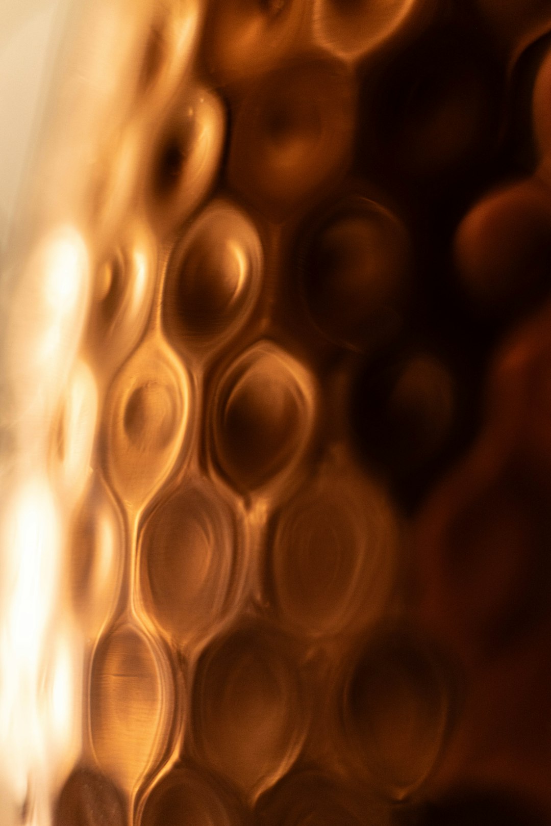 a-close-up-of-a-glass-with-some-liquid-in-it-ytb0tyvgnn4